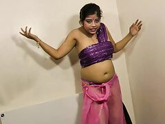 Gujarati beauty Rupali engages in disrespectful chatting while stripping down to her bra and panties, teasing her big tits.